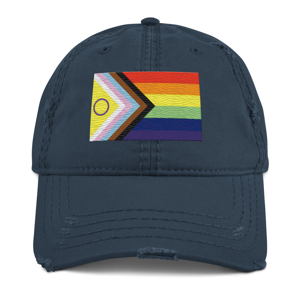 Navy blue cap with a colorful pride progress flag geometric design on a white background